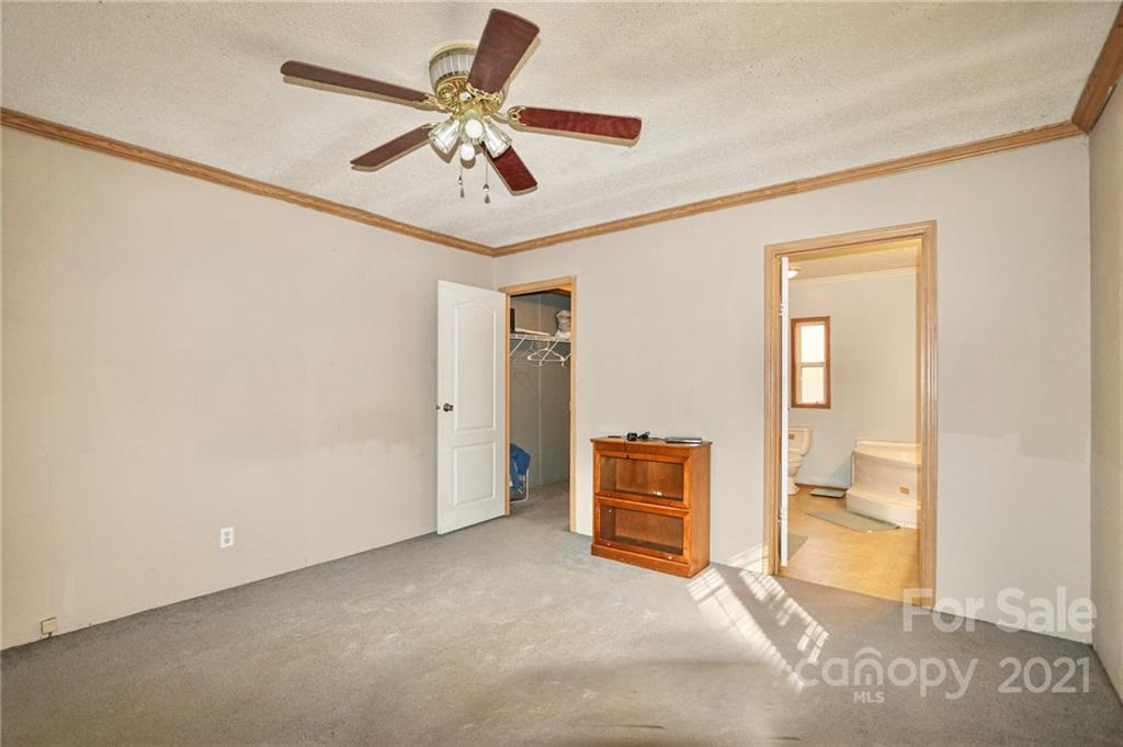 117 Valley Springs Road Olin, NC 28660 - Photo 21 of 38 a view of livingroom with hardwood