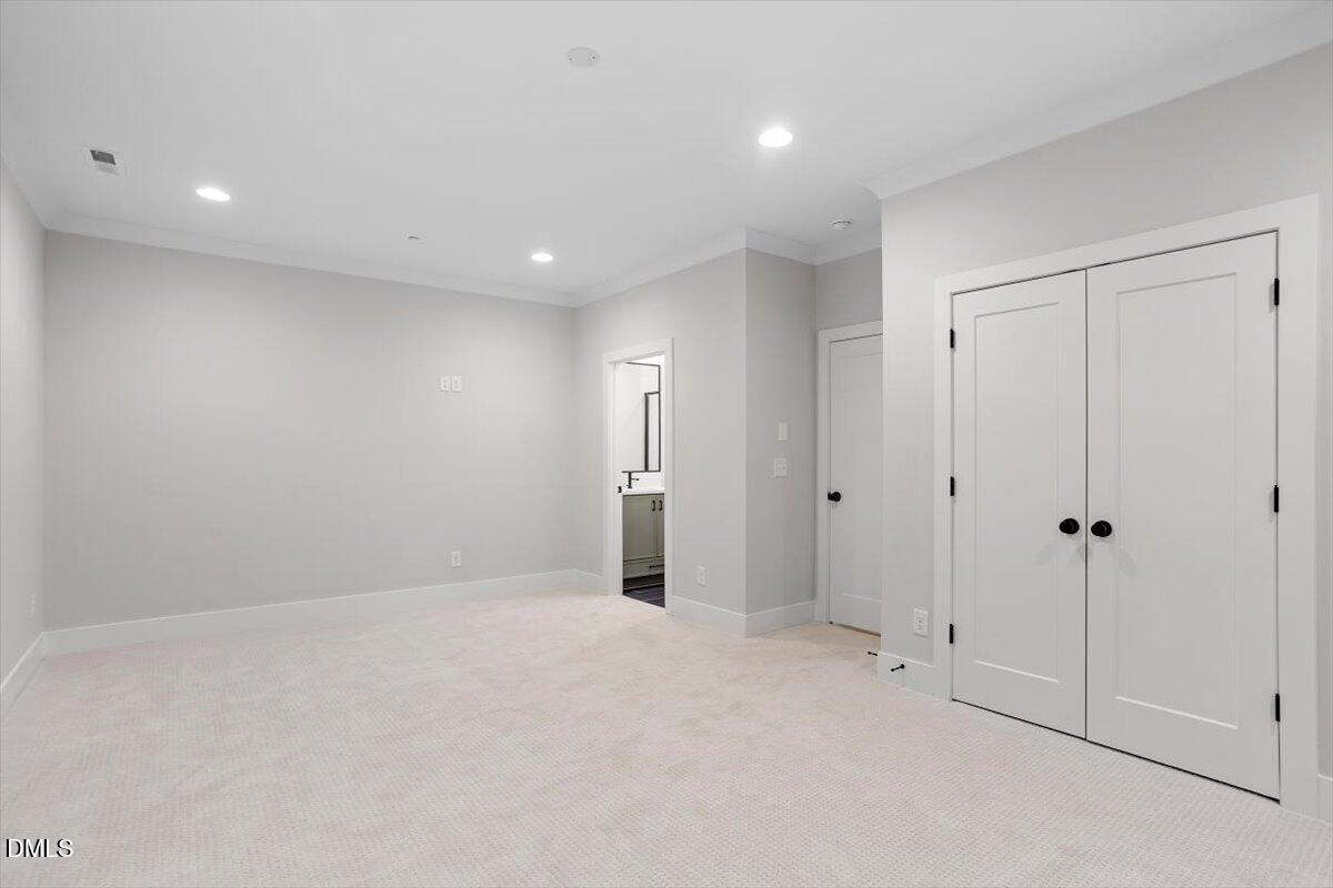 811 Maple Berry Lane, Unit 101 Raleigh, NC 27607 - Photo 37 of 45 a view of an empty room