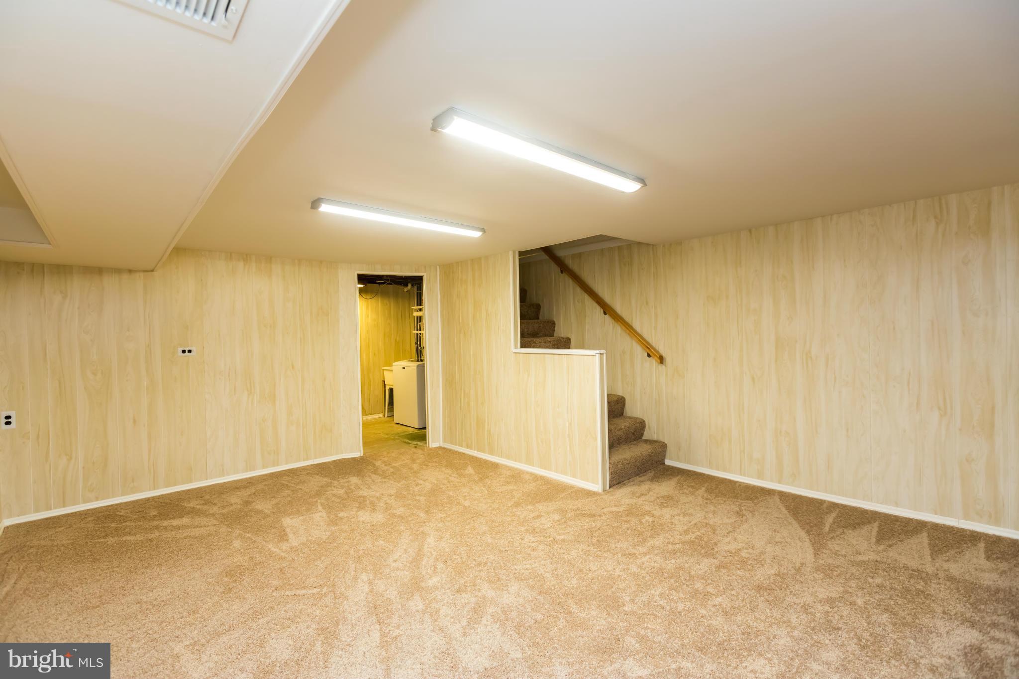 4424 Scotia Road Baltimore, MD 21227 - Photo 22 of 26 an empty room with a empty space