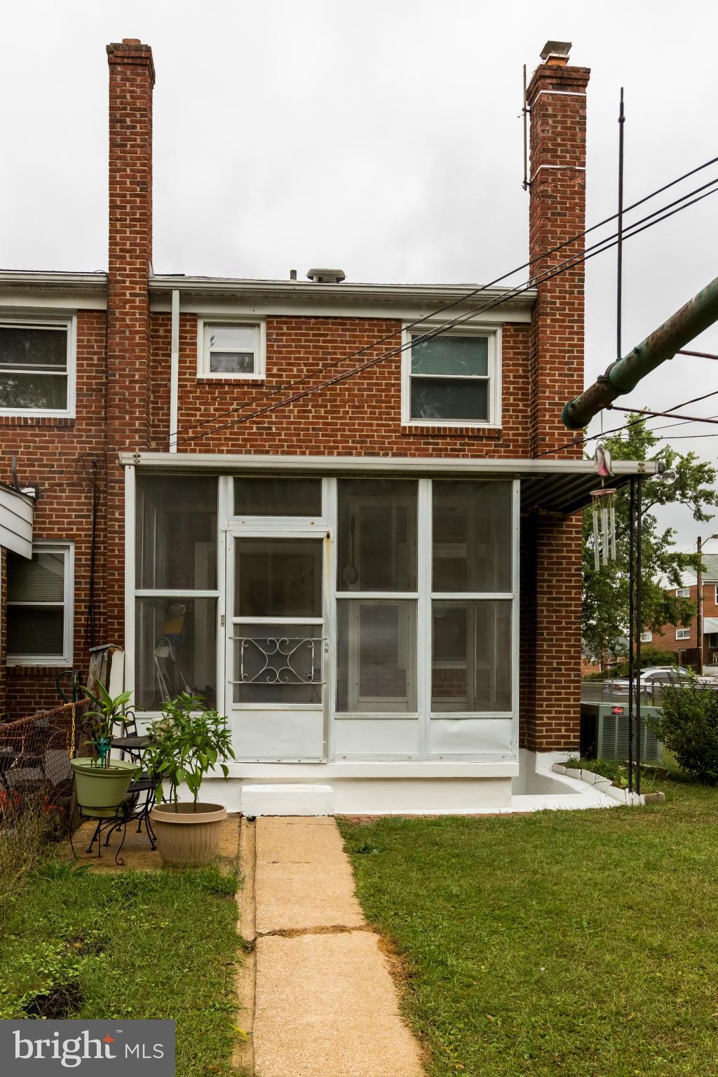 4424 Scotia Road Baltimore, MD 21227 - Photo 25 of 26 a house view with a garden space