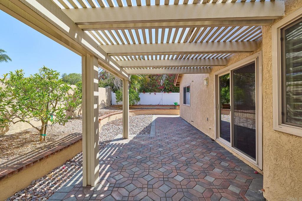 932 Alyssum Road Carlsbad, CA 92011 - Photo 20 of 31 a patio with table and chairs