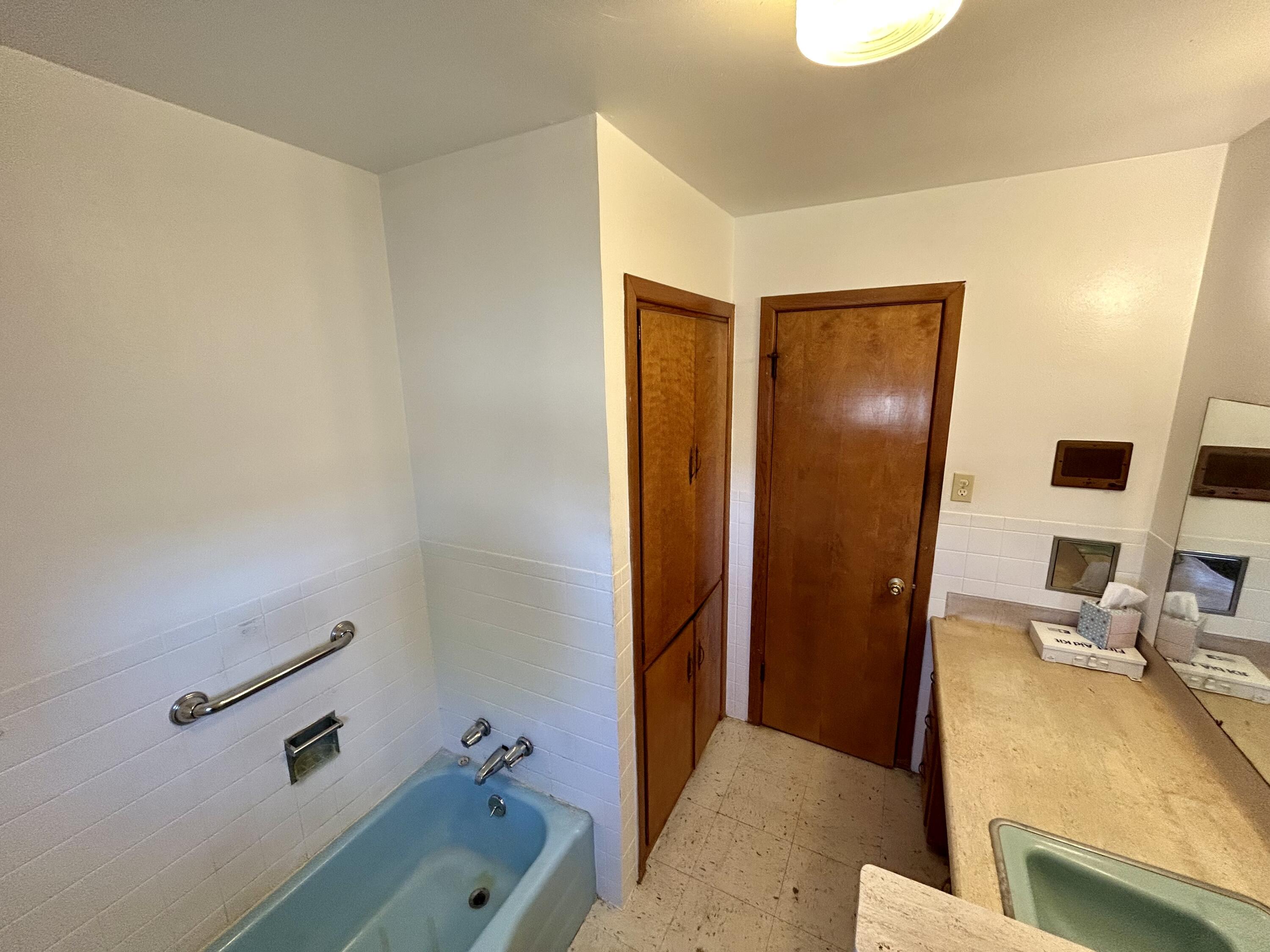 2101 Farm To Market 97 Lockney, TX 79241 - Photo 17 of 35 a bathroom with a tub and sink