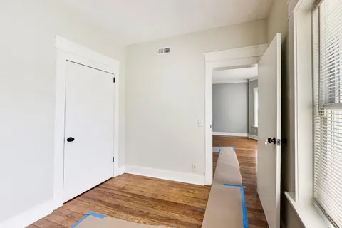 a view of a bathroom from a hallway