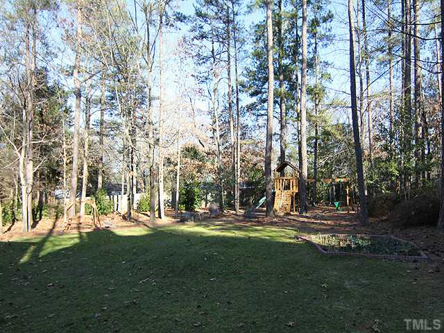 2402 Eddystone Road Raleigh, NC 27612 - Photo 24 of 25 a view of outdoor space with garden