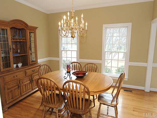 2402 Eddystone Road Raleigh, NC 27612 - Photo 7 of 25 a view of a dining room with furniture and window
