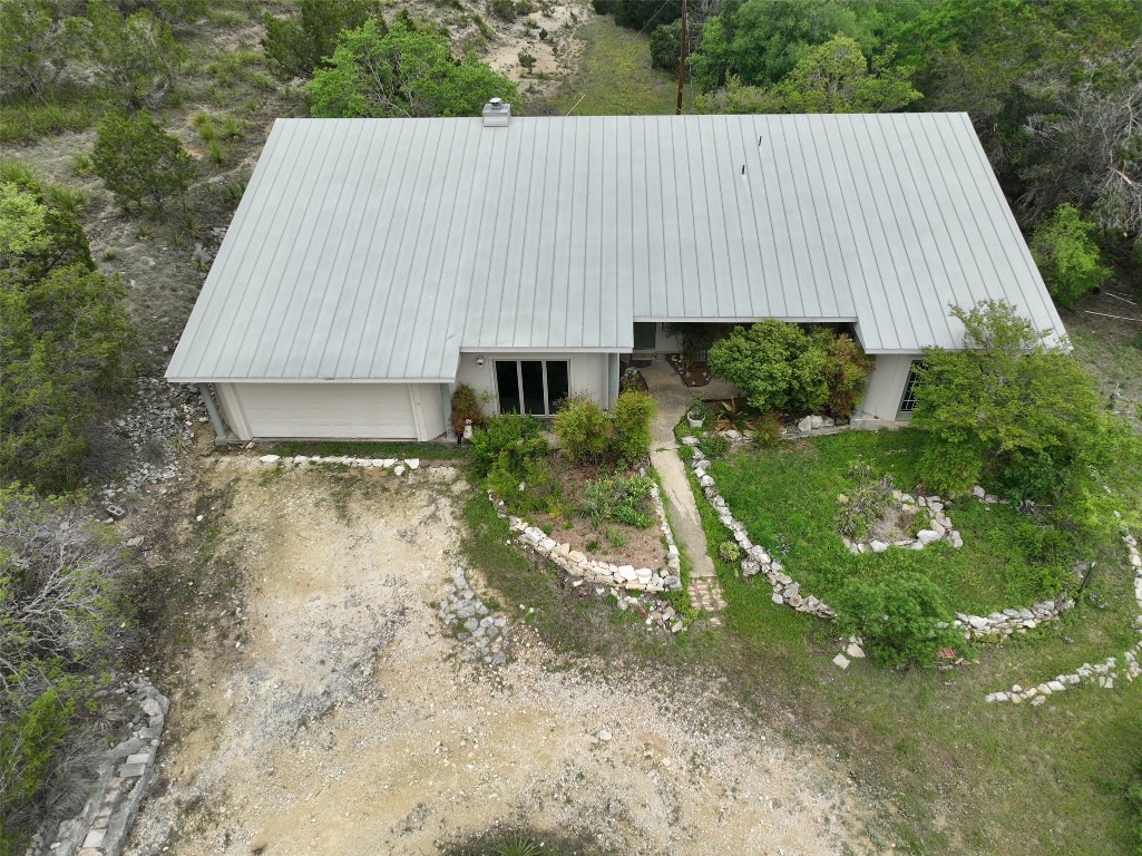 a aerial view of a house having yard