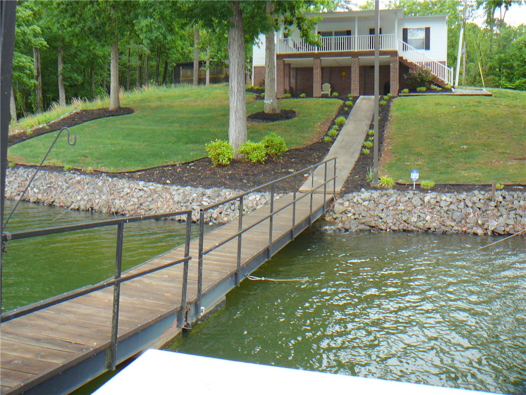 34 Owens Point Road Abbeville, SC 29620 - Photo 7 of 22 This charming home offers direct water access and picturesque surroundings.