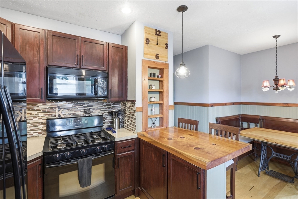 2 Cashman Road Peabody, MA 01960 - Photo 13 of 37 a kitchen with a stove and a microwave