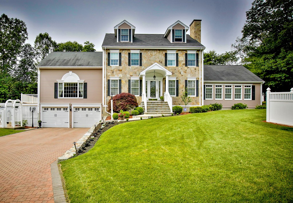 10 Hammersmith Drive Saugus, MA 01906 - Photo 1 of 30 a front view of house with yard and green space