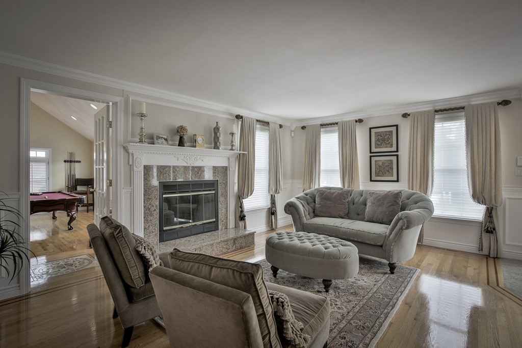 10 Hammersmith Drive Saugus, MA 01906 - Photo 12 of 30 a living room with furniture and a fireplace