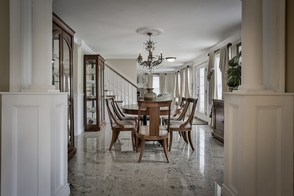10 Hammersmith Drive Saugus, MA 01906 - Photo 13 of 30 a view of a dining room with furniture and window