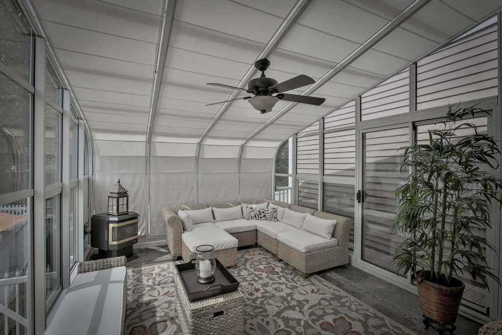 10 Hammersmith Drive Saugus, MA 01906 - Photo 19 of 30 a balcony with couch and outdoor seating