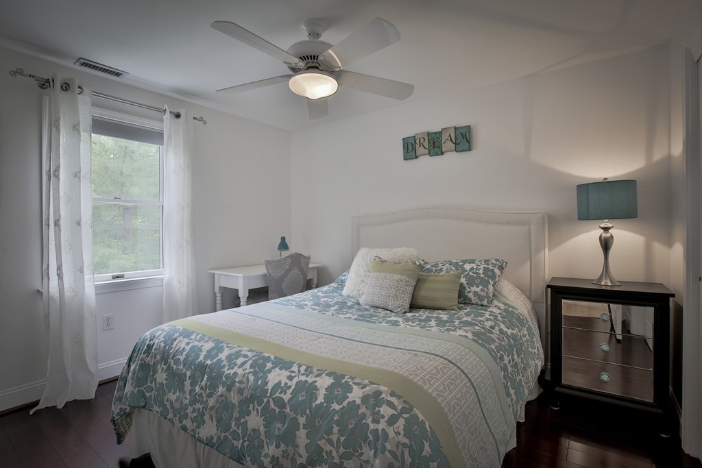 10 Hammersmith Drive Saugus, MA 01906 - Photo 20 of 30 a bedroom with a bed and window