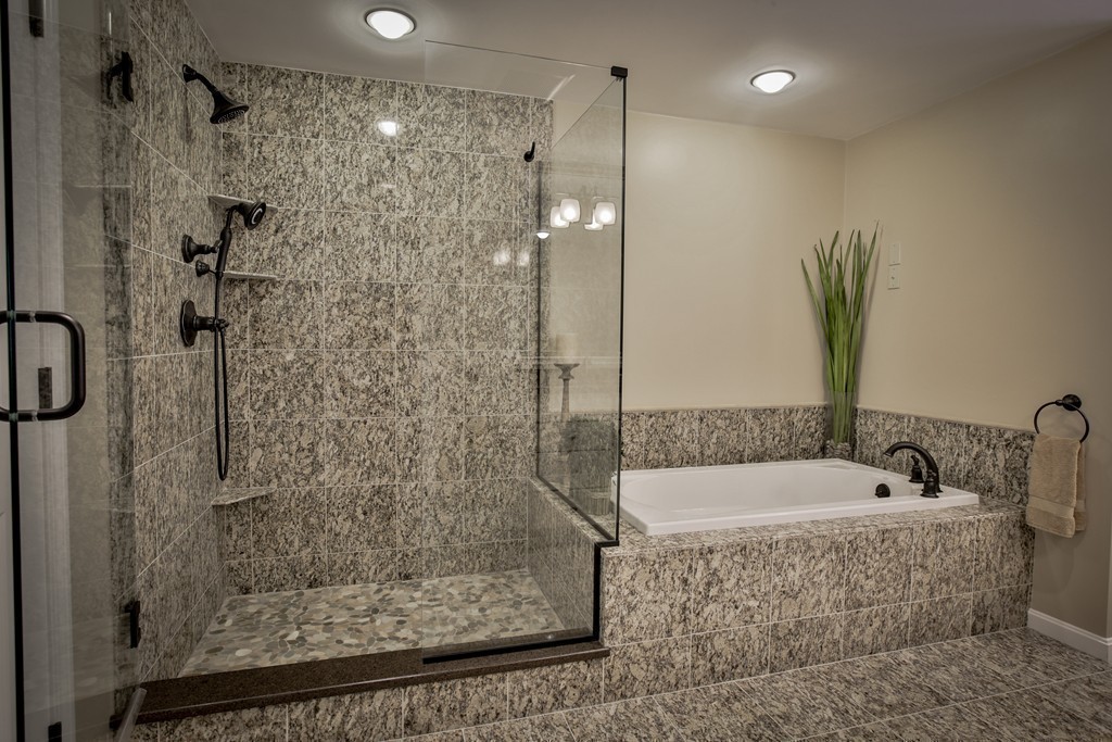 10 Hammersmith Drive Saugus, MA 01906 - Photo 27 of 30 a bathroom with a shower and a tub