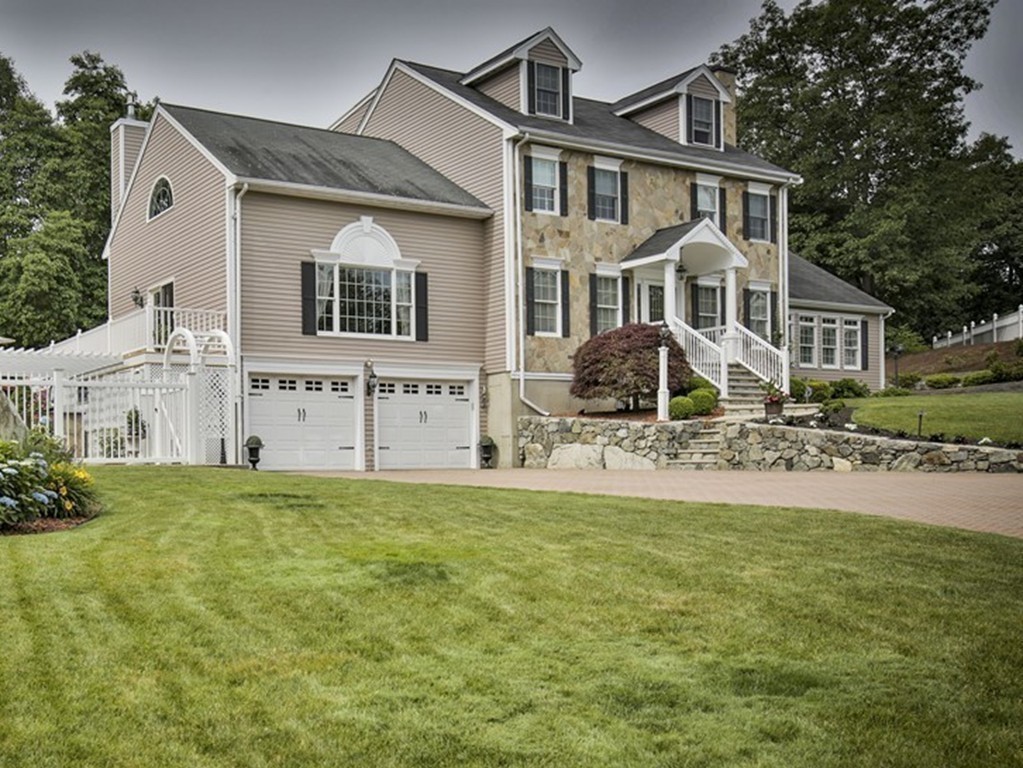 10 Hammersmith Drive Saugus, MA 01906 - Photo 30 of 30 a front view of a house with a yard