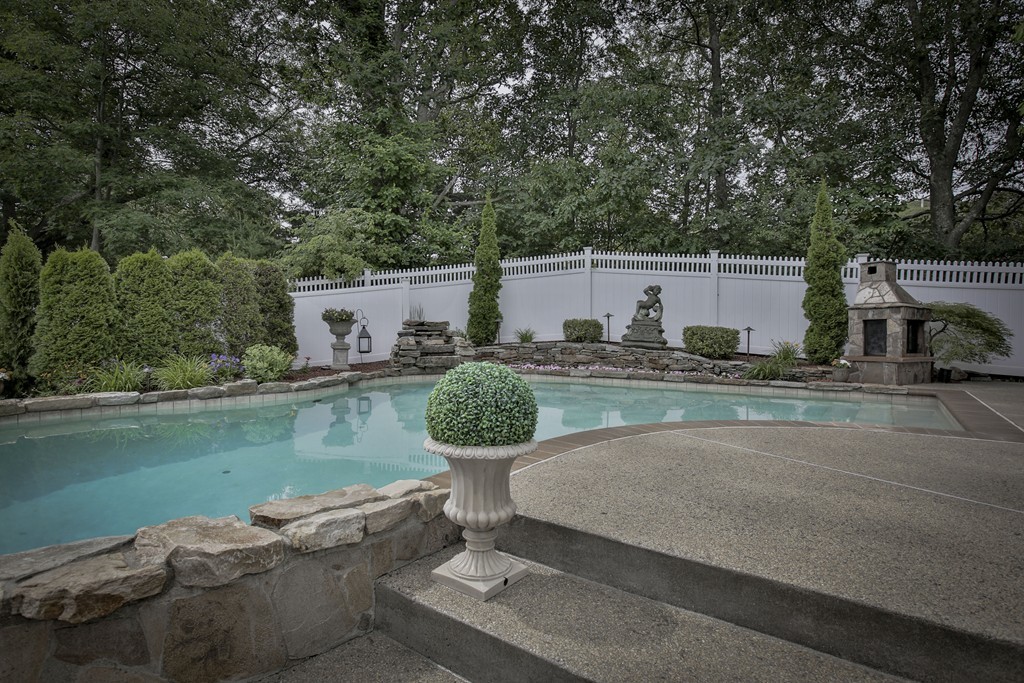 10 Hammersmith Drive Saugus, MA 01906 - Photo 3 of 30 a view of a swimming pool with a patio
