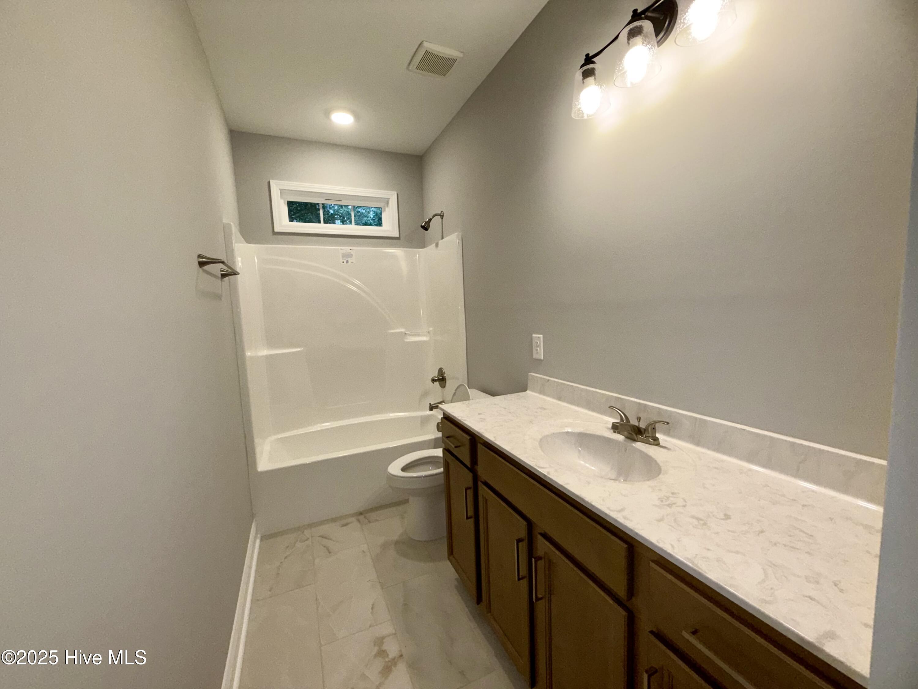12470 Blues Farm Road Laurinburg, NC 28352 - Photo 25 of 28 2nd bathroom