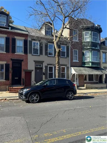 a car parked in front of a building