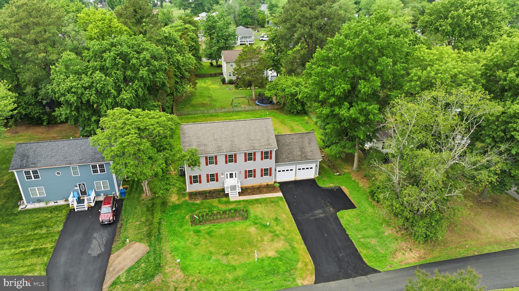29725 Bruce Road Mechanicsville, MD 20659 - Photo 8 of 79 an aerial view of a house with swimming pool garden and patio