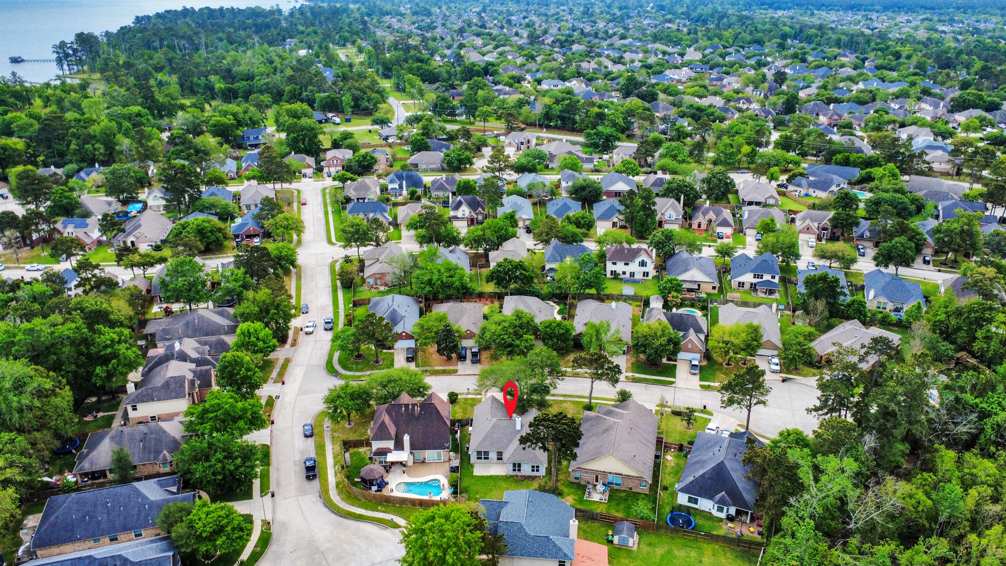14423 Gadwall Court Houston, TX 77044 - Photo 4 of 42 an aerial view of residential houses with outdoor space and street view