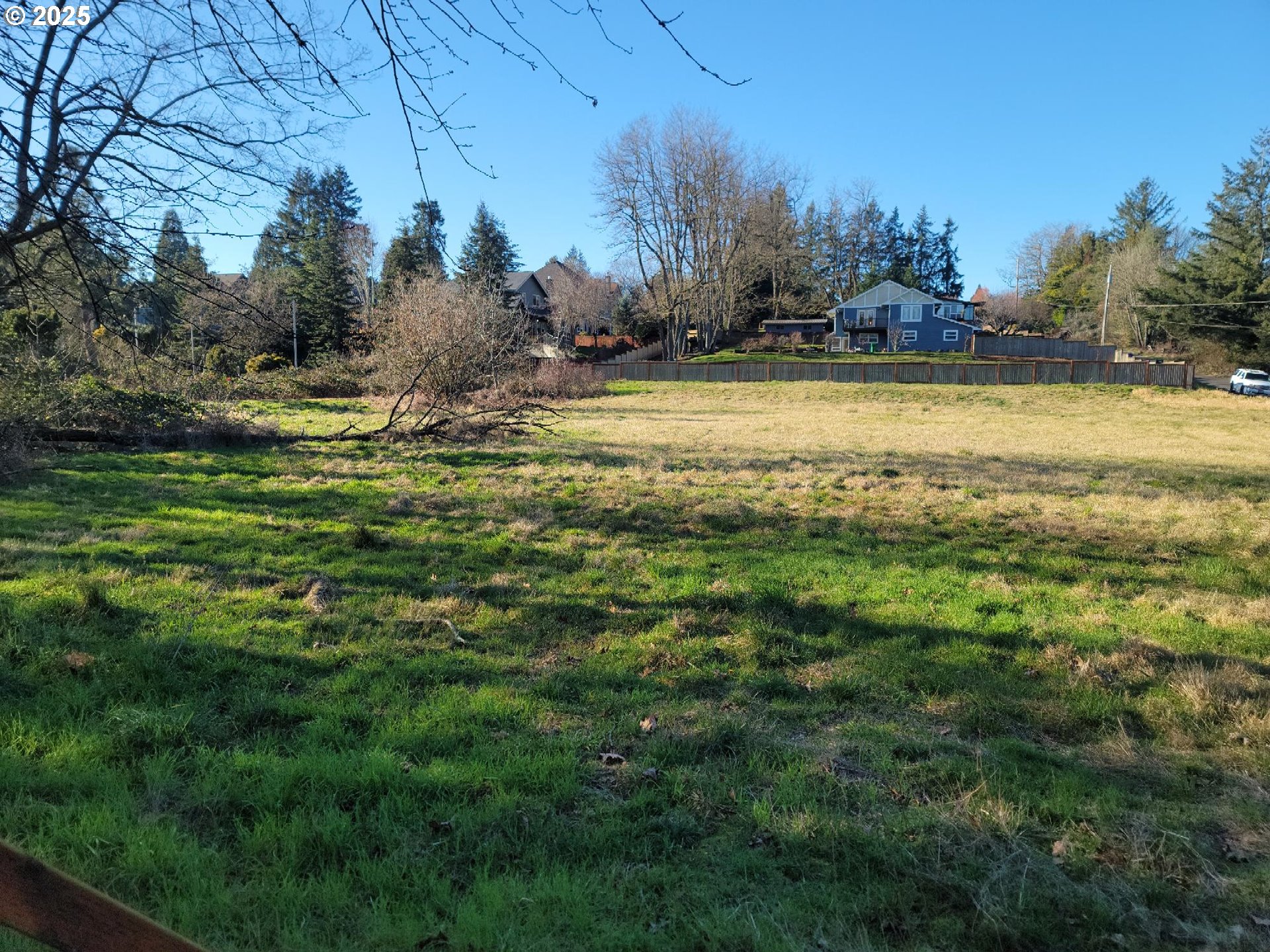 Clara Lane Lake Oswego, OR 97035 - Photo 3 of 18 a view of a yard with a house in the background