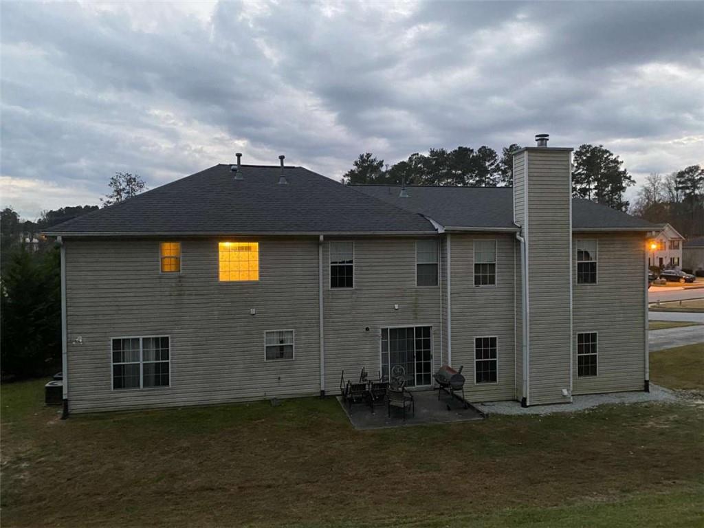 7808 Providence Point Way Lithonia, GA 30058 - Photo 23 of 23 front view of house with a yard
