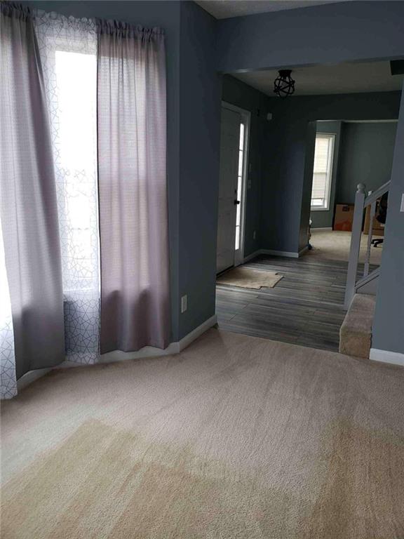 7808 Providence Point Way Lithonia, GA 30058 - Photo 6 of 23 an empty room with windows