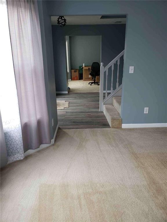 7808 Providence Point Way Lithonia, GA 30058 - Photo 9 of 23 a view of a hallway view with staircase