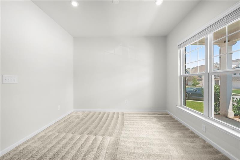 5899 Wheeler Ridge Road Auburn, GA 30011 - Photo 12 of 43 an empty room with a window
