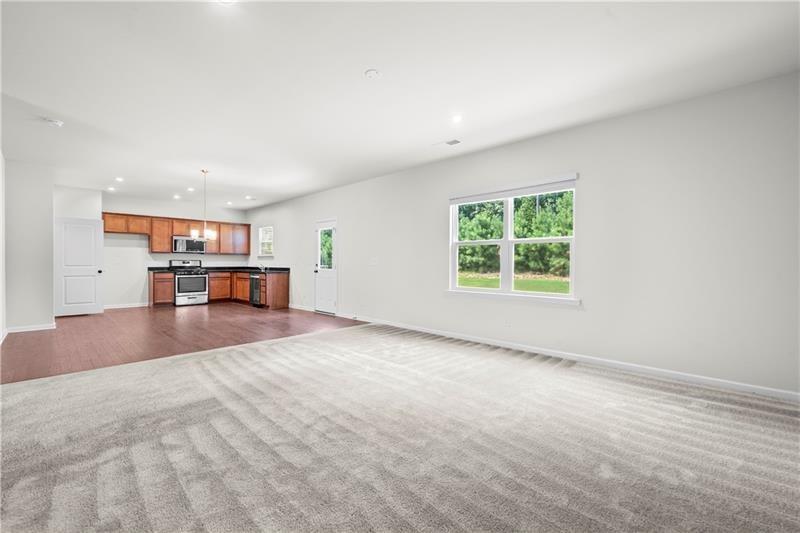 5899 Wheeler Ridge Road Auburn, GA 30011 - Photo 17 of 43 a view of empty room with a window