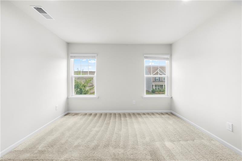 5899 Wheeler Ridge Road Auburn, GA 30011 - Photo 29 of 43 an empty room with a window