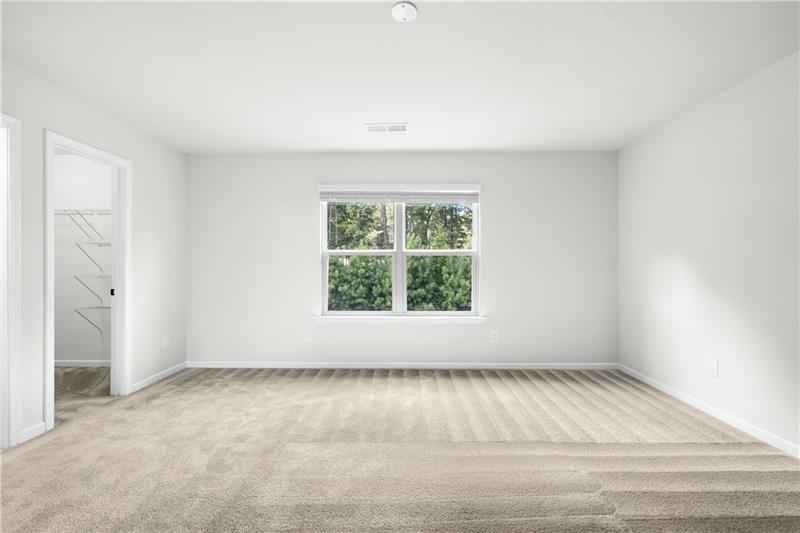 5899 Wheeler Ridge Road Auburn, GA 30011 - Photo 33 of 43 an empty room with a window