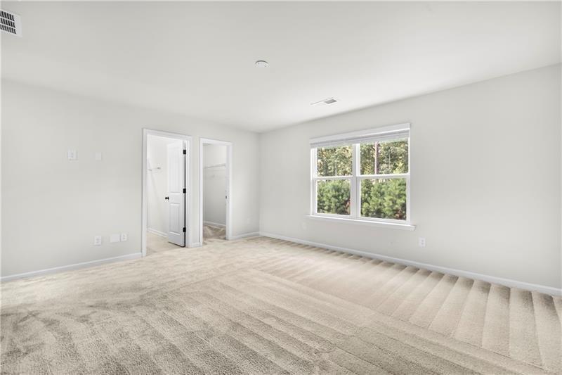 5899 Wheeler Ridge Road Auburn, GA 30011 - Photo 34 of 43 a view of an empty room with a window