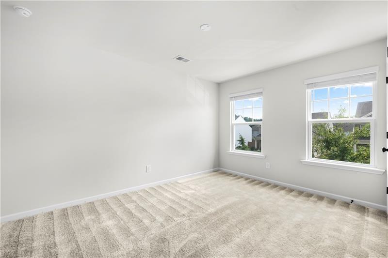 5899 Wheeler Ridge Road Auburn, GA 30011 - Photo 37 of 43 a view of an empty room with a window