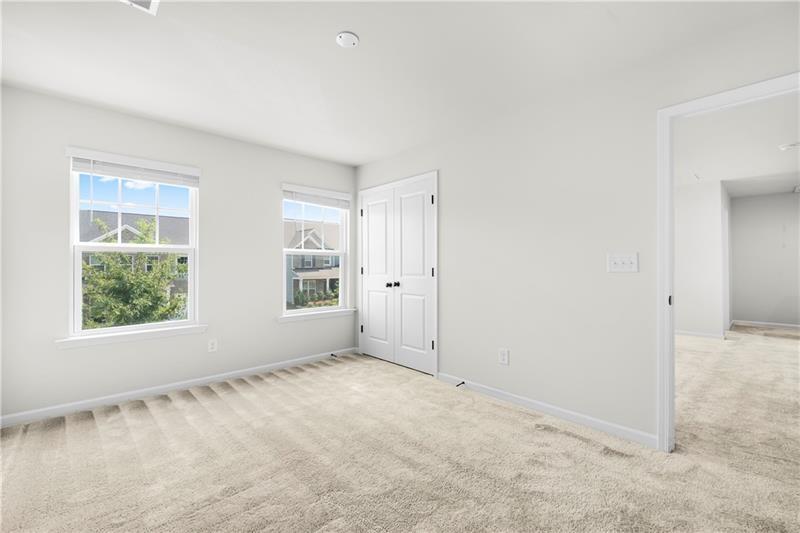5899 Wheeler Ridge Road Auburn, GA 30011 - Photo 38 of 43 an empty room with windows
