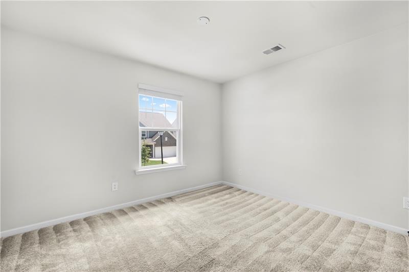 5899 Wheeler Ridge Road Auburn, GA 30011 - Photo 39 of 43 an empty room with a window
