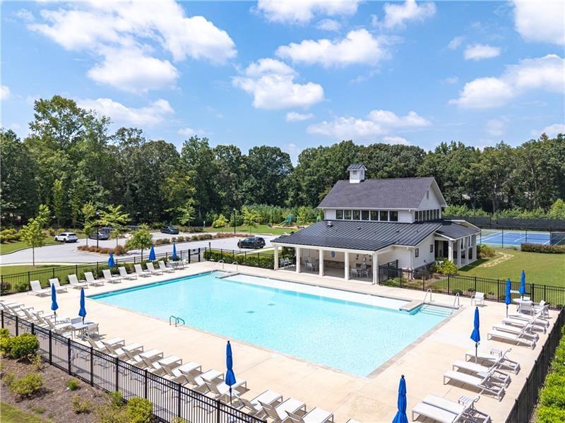 5899 Wheeler Ridge Road Auburn, GA 30011 - Photo 6 of 43 a swimming pool with outdoor seating and city view