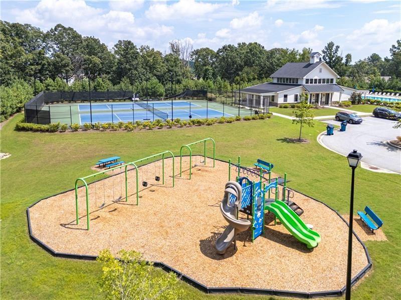 5899 Wheeler Ridge Road Auburn, GA 30011 - Photo 8 of 43 an aerial view of a house with outdoor space
