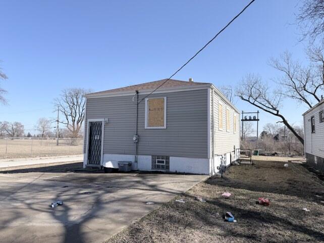 2300 Fillmore Street Gary, IN 46407 - Photo 5 of 16 a front view of a house with a yard