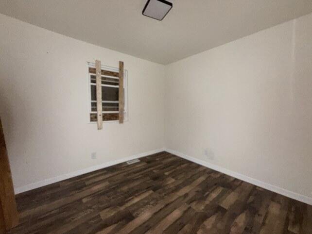 2300 Fillmore Street Gary, IN 46407 - Photo 10 of 16 a view of room with window and hardwood floor