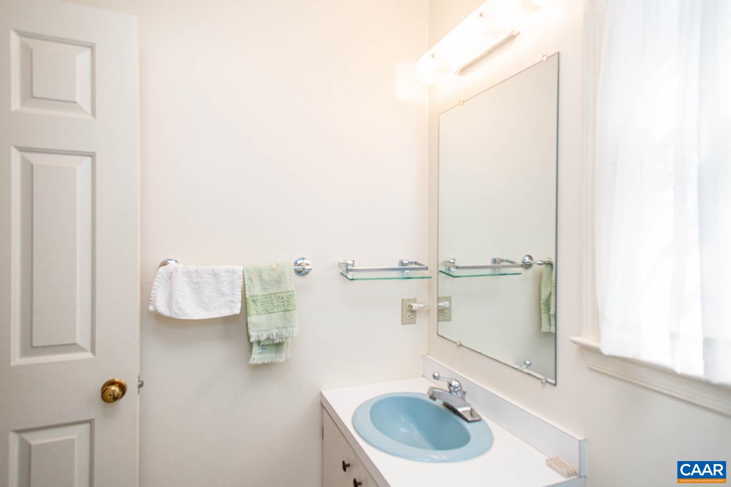 3575 Morgantown Road Charlottesville, VA 22903 - Photo 40 of 46 a bathroom with a sink and a mirror