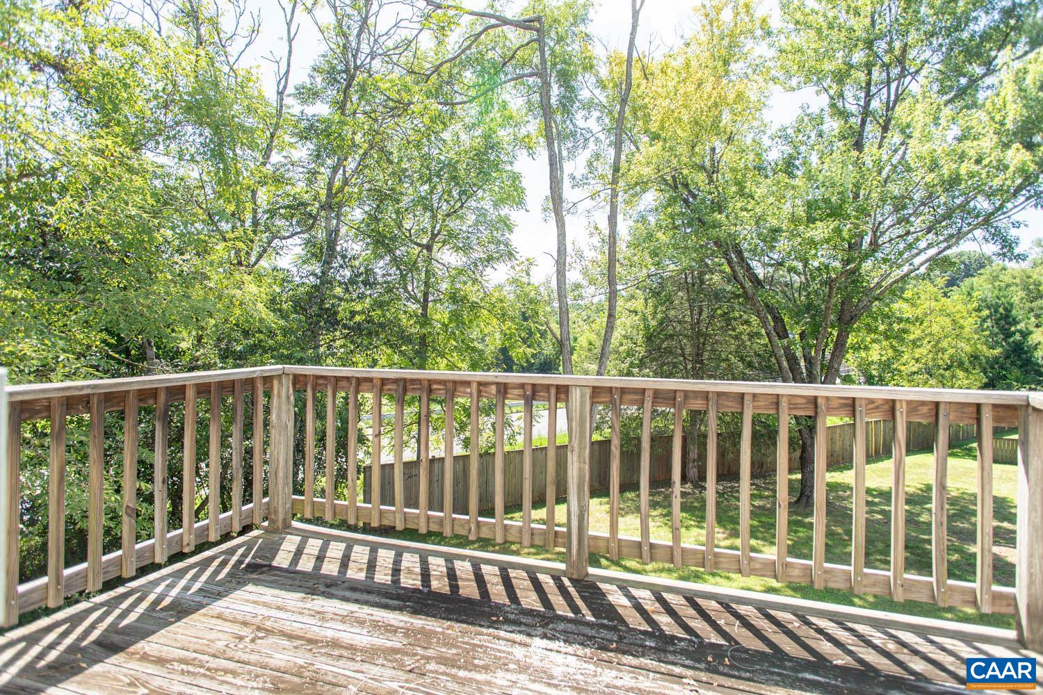3575 Morgantown Road Charlottesville, VA 22903 - Photo 42 of 46 a balcony with trees in front of it