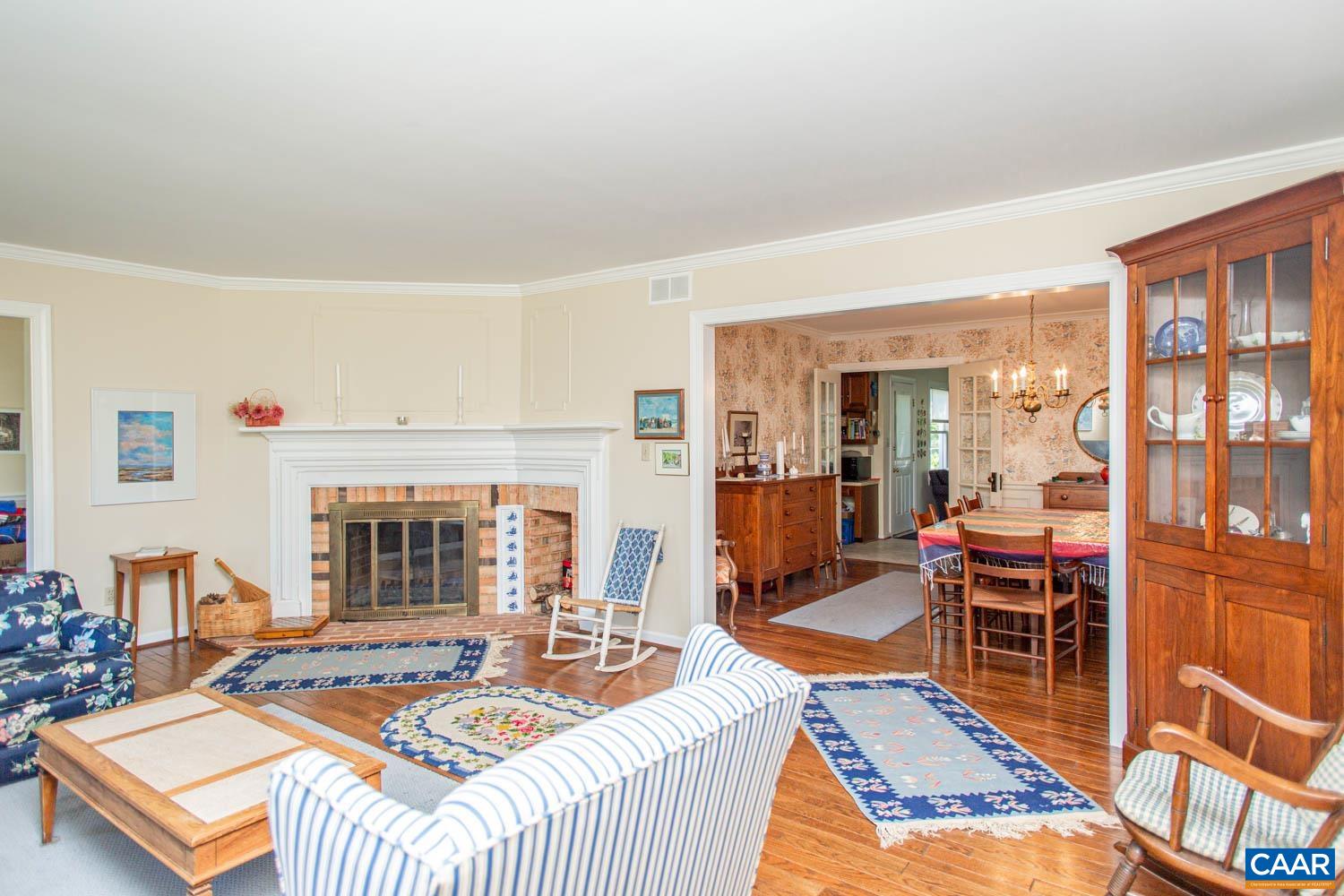 3575 Morgantown Road Charlottesville, VA 22903 - Photo 5 of 46 a living room with fireplace furniture and a table