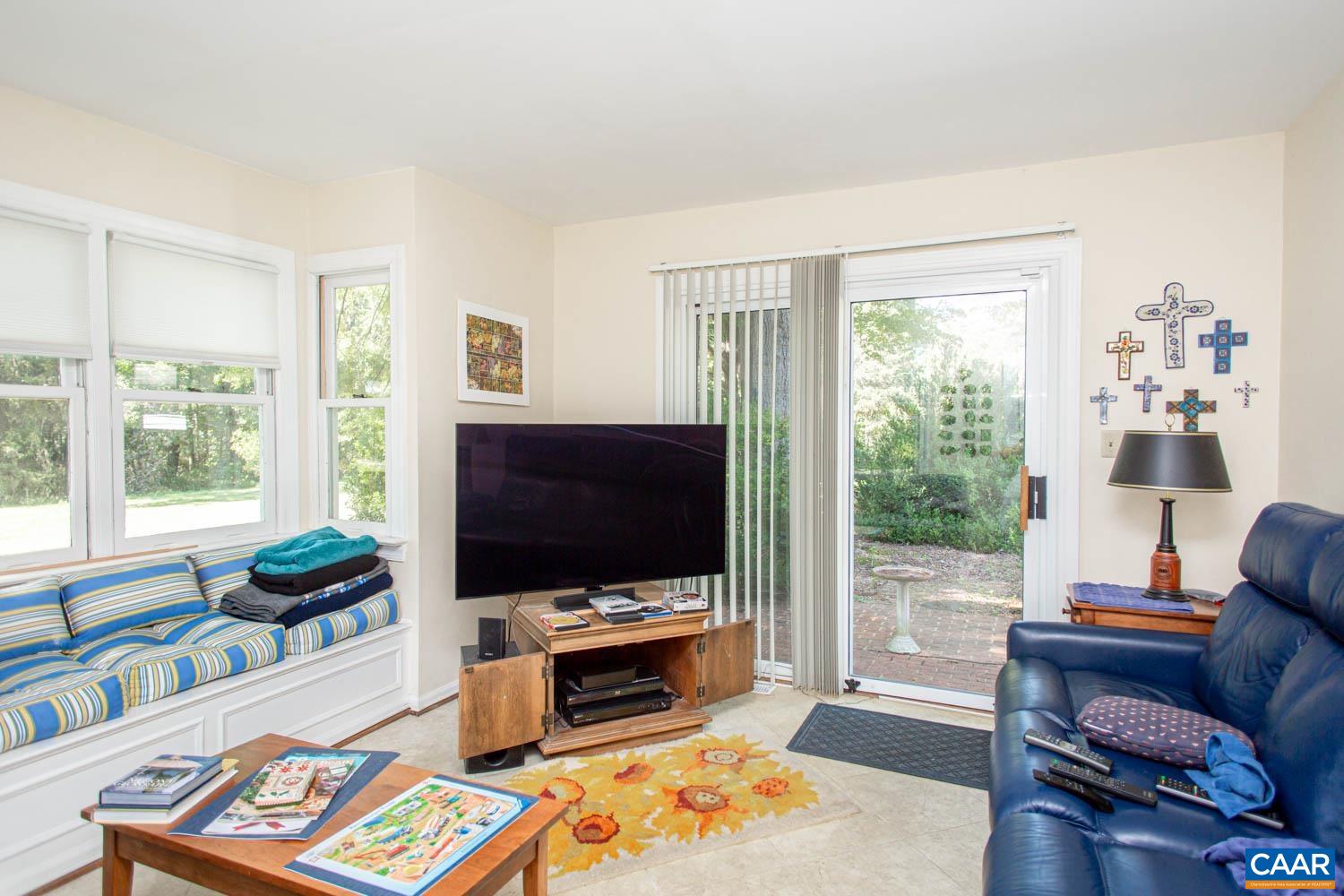3575 Morgantown Road Charlottesville, VA 22903 - Photo 10 of 46 a living room with furniture and a flat screen tv