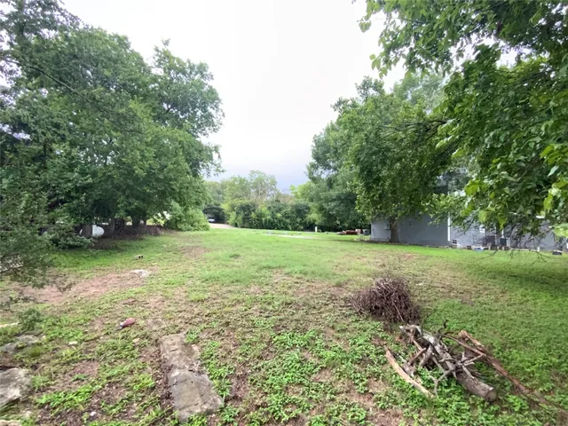 a view of outdoor space with deck and yard