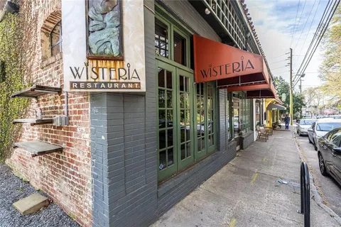 a view of a building with a bench