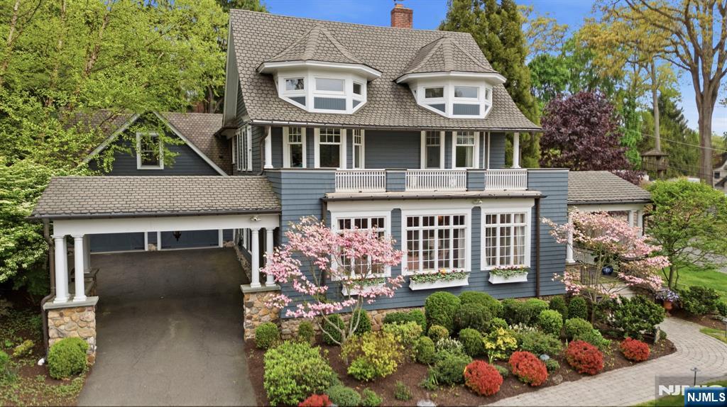 203 Heights Road Ridgewood, NJ 07450 - Photo 2 of 41 front view of a house with a small yard