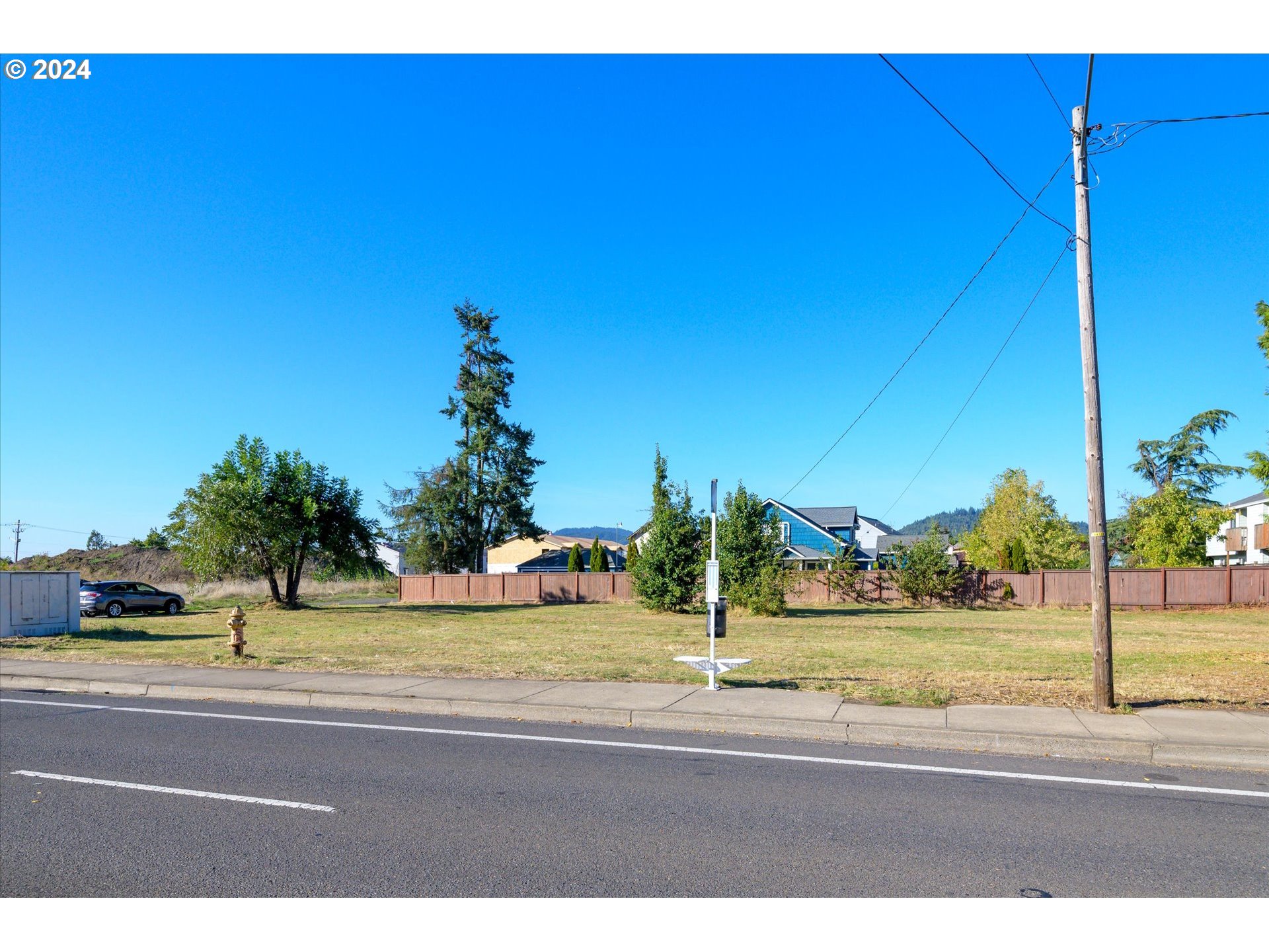North Main Between 48-49th Street Springfield, OR 97478 - Photo 6 of 10 a view of a building and car parked