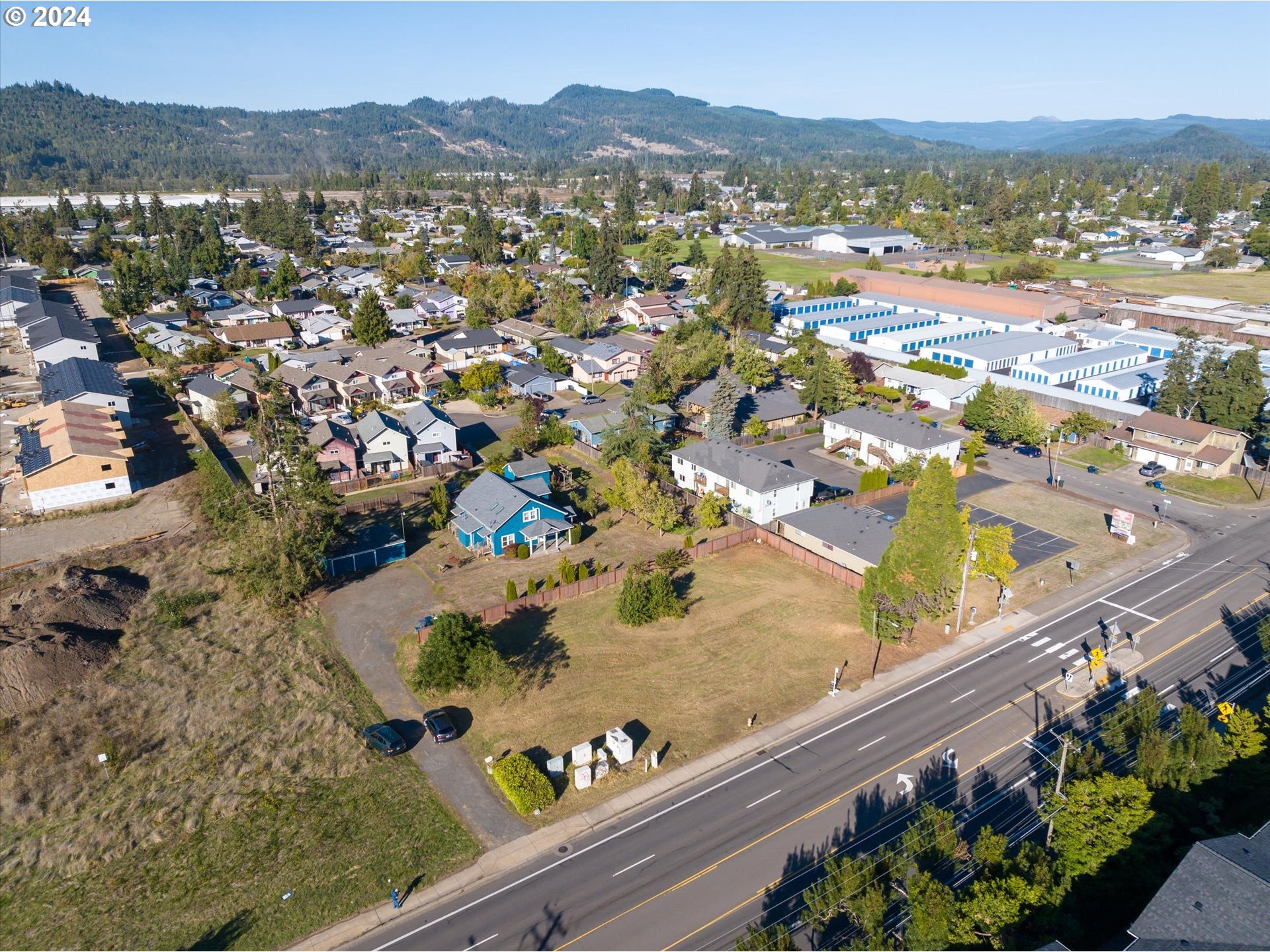 North Main Between 48-49th Street Springfield, OR 97478 - Photo 7 of 10 a view of a city with a mountain