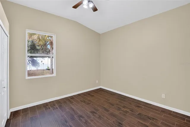 a bathroom with a sink toilet and a mirror